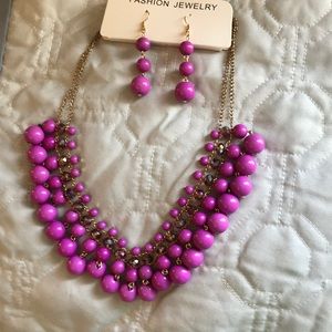 Beaded necklace and earrings.